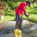 Why Electricians Prefer Soft Washing Over Pressure Washing Near Outdoor Power Systems